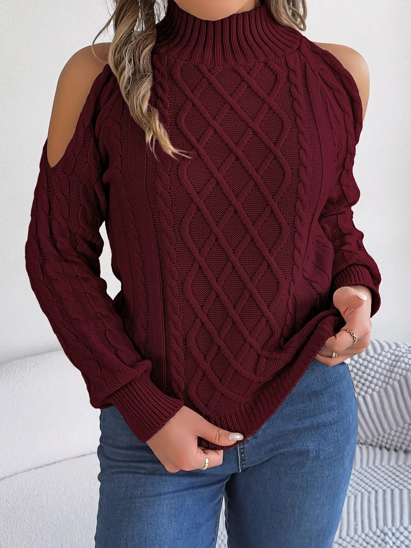 Women's twisted knit sweater with strapless half-high collar and long lantern sleeves in acrylic