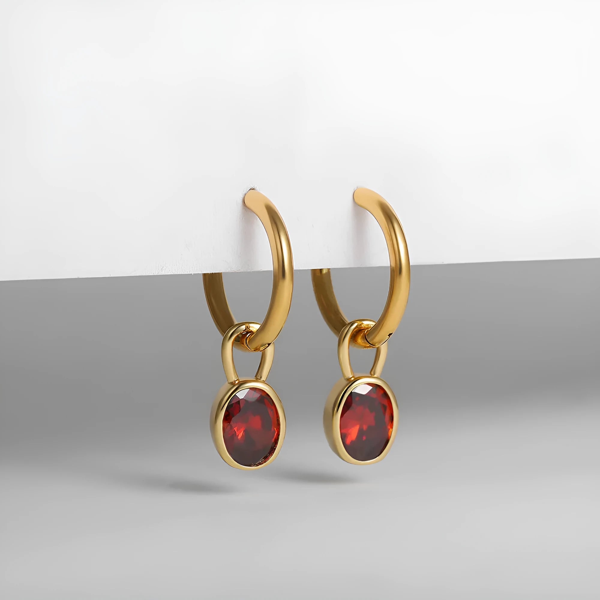 Women's retro oval zircon earrings in copper with ellipse detailing shown in six colour variants