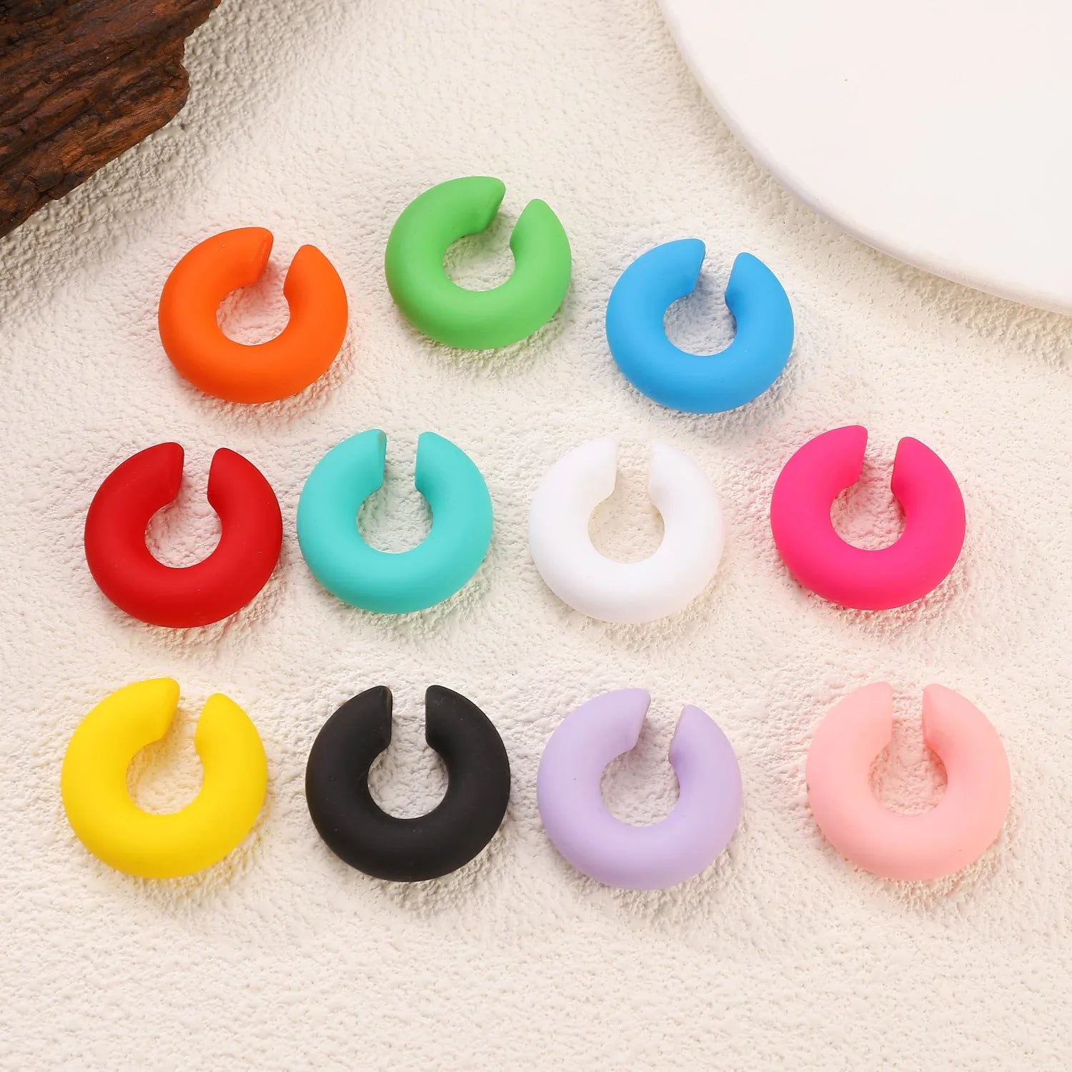 C-shaped matte coarse round clip-on earrings in a choice of 15 candy colours for women.