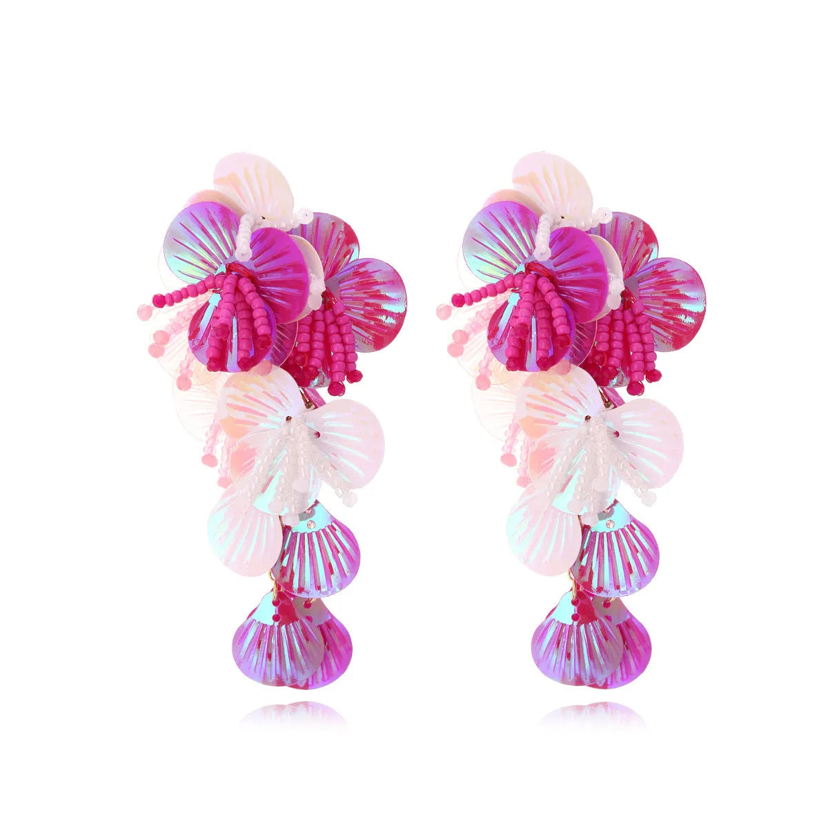 Handmade colourful beaded flower and leaf earrings in exaggerated dopamine style.
