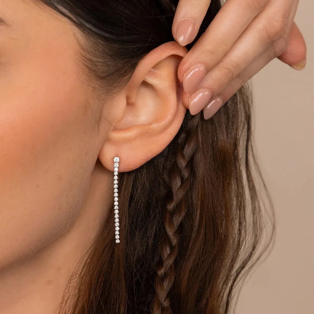 Geometric-shaped stainless steel zircon earrings for women in gold and steel colour options.