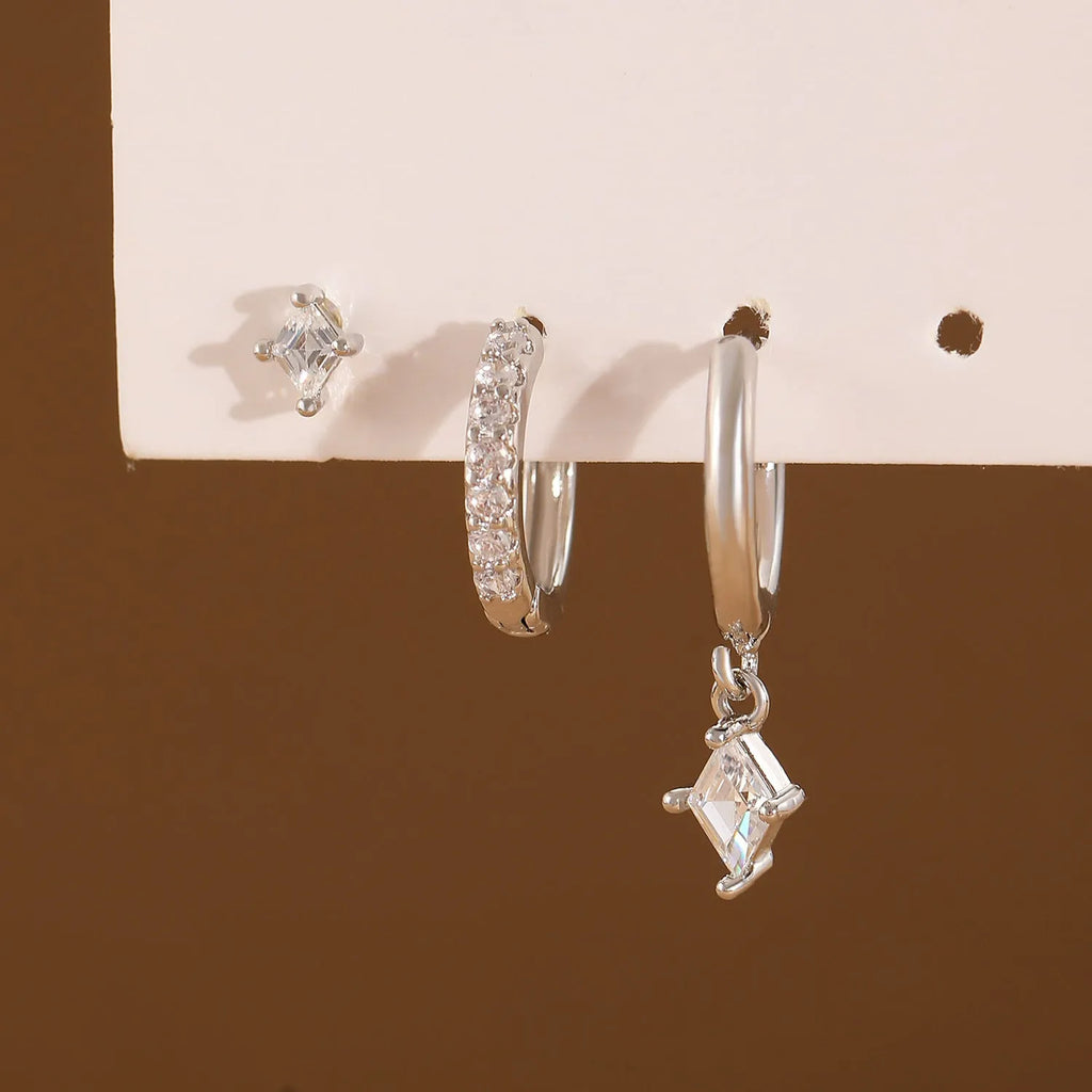 Ladies three-piece geometric earring set with zircon stones in gold and white finish options