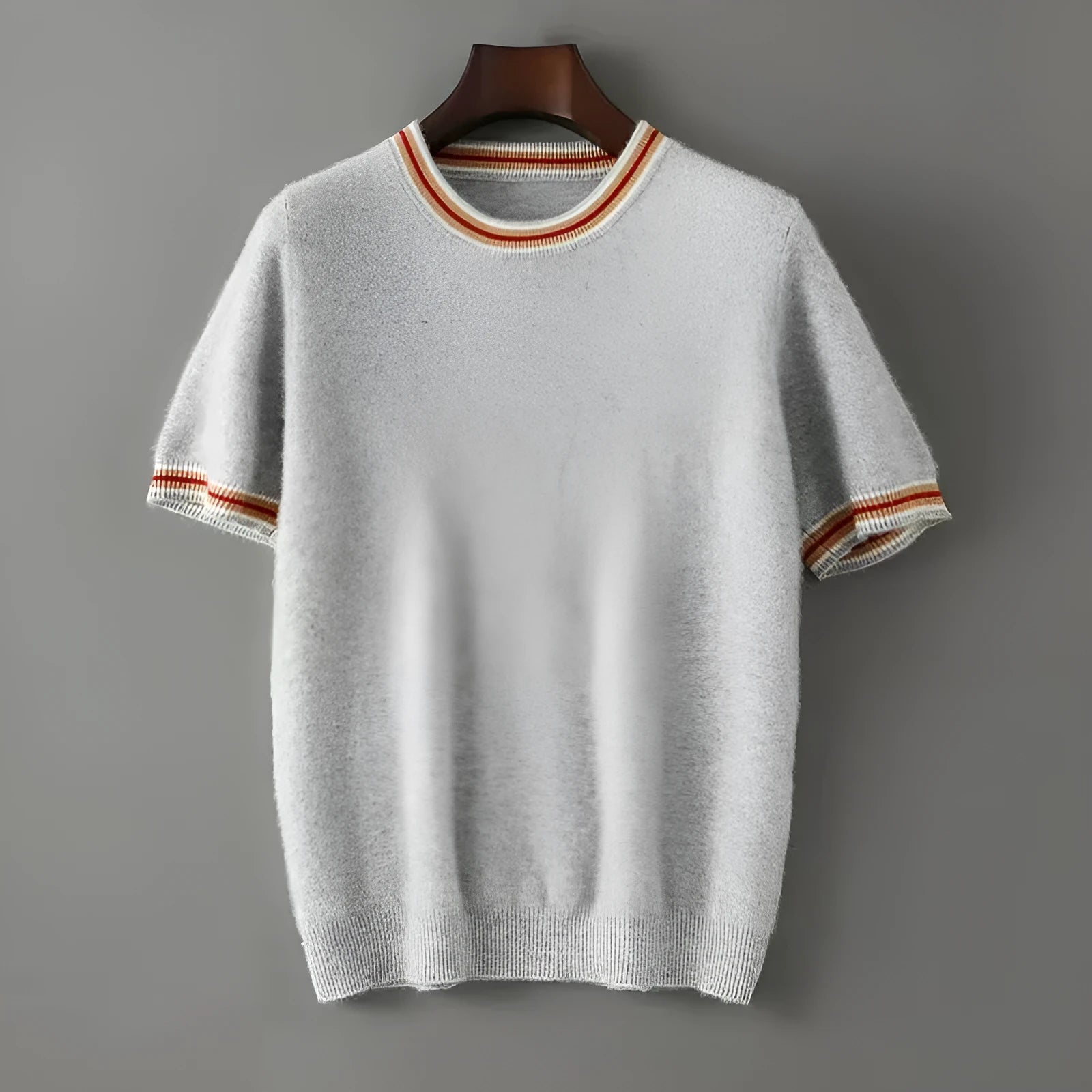 Men's pure wool short sleeve pullover sweater in round neck design shown in white, grey and black colours