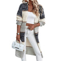 Grey stripes and plaid pattern on a women's loose fit knitted long cardigan with long sleeves.