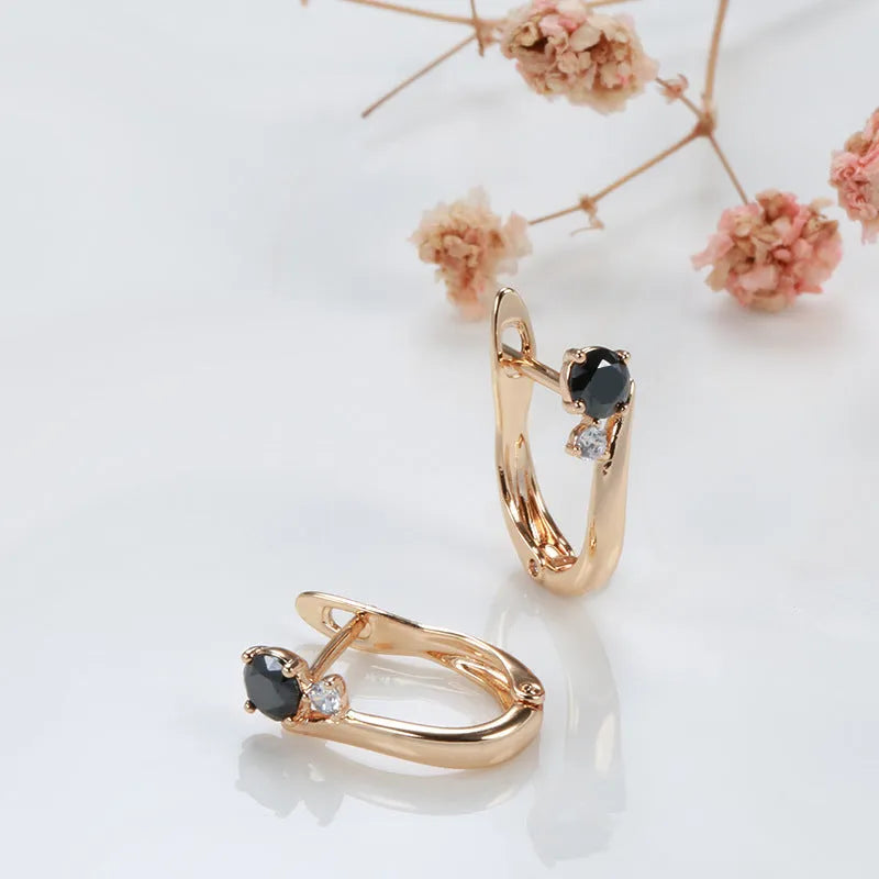 Women's gold geometric black agate drop earrings with retro styling and copper construction