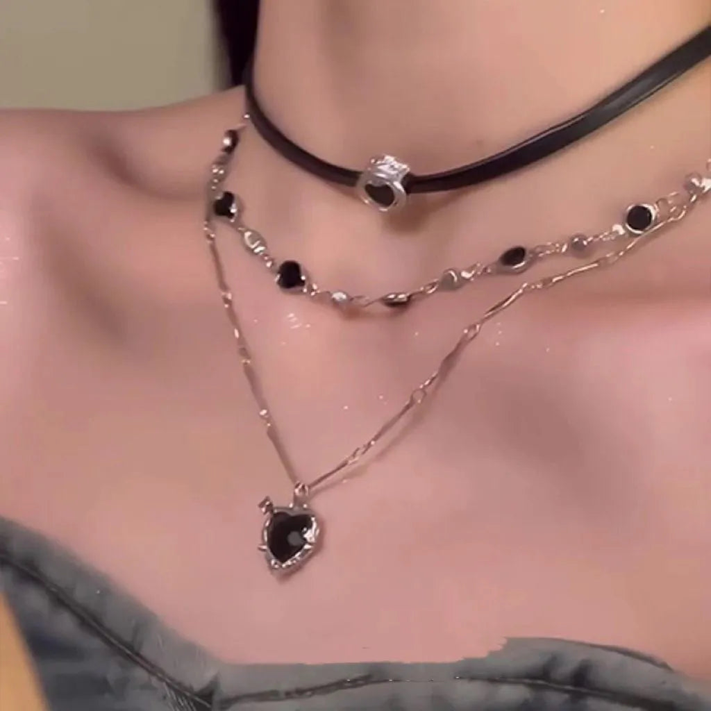 Women's creative multi-layer twin necklace set with heart-shaped leather and crystal pendants on adjustable chain