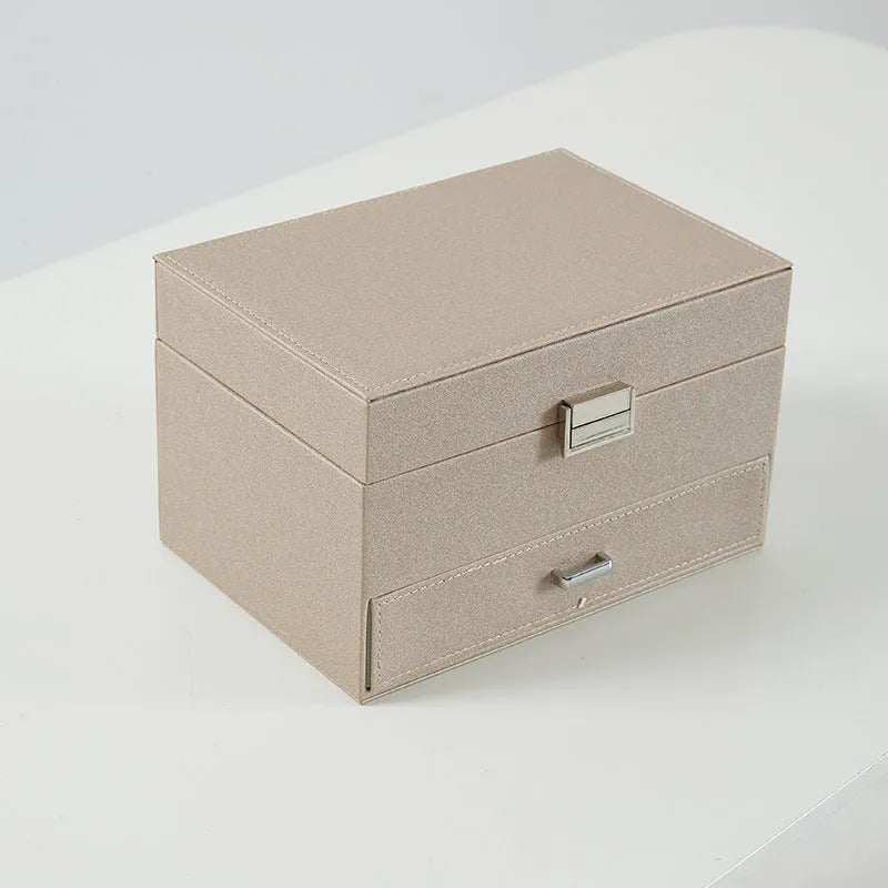 Solid colour hard PU leather jewelry storage box for earrings and necklaces.