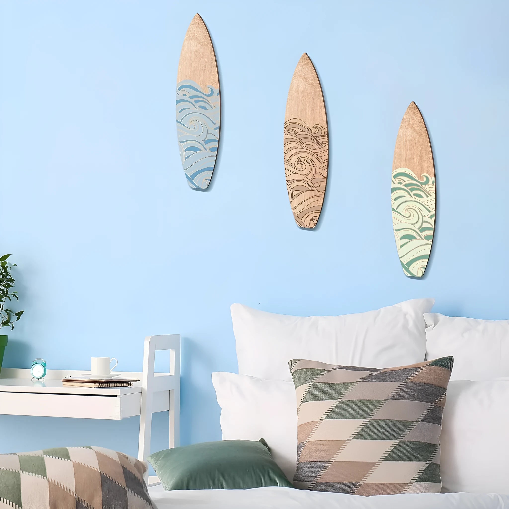 Three identical wooden surfboard wall decorations with European-style carving