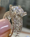 Geometric silver fashion ring for women in gold or white electroplated alloy, showing round design elements.