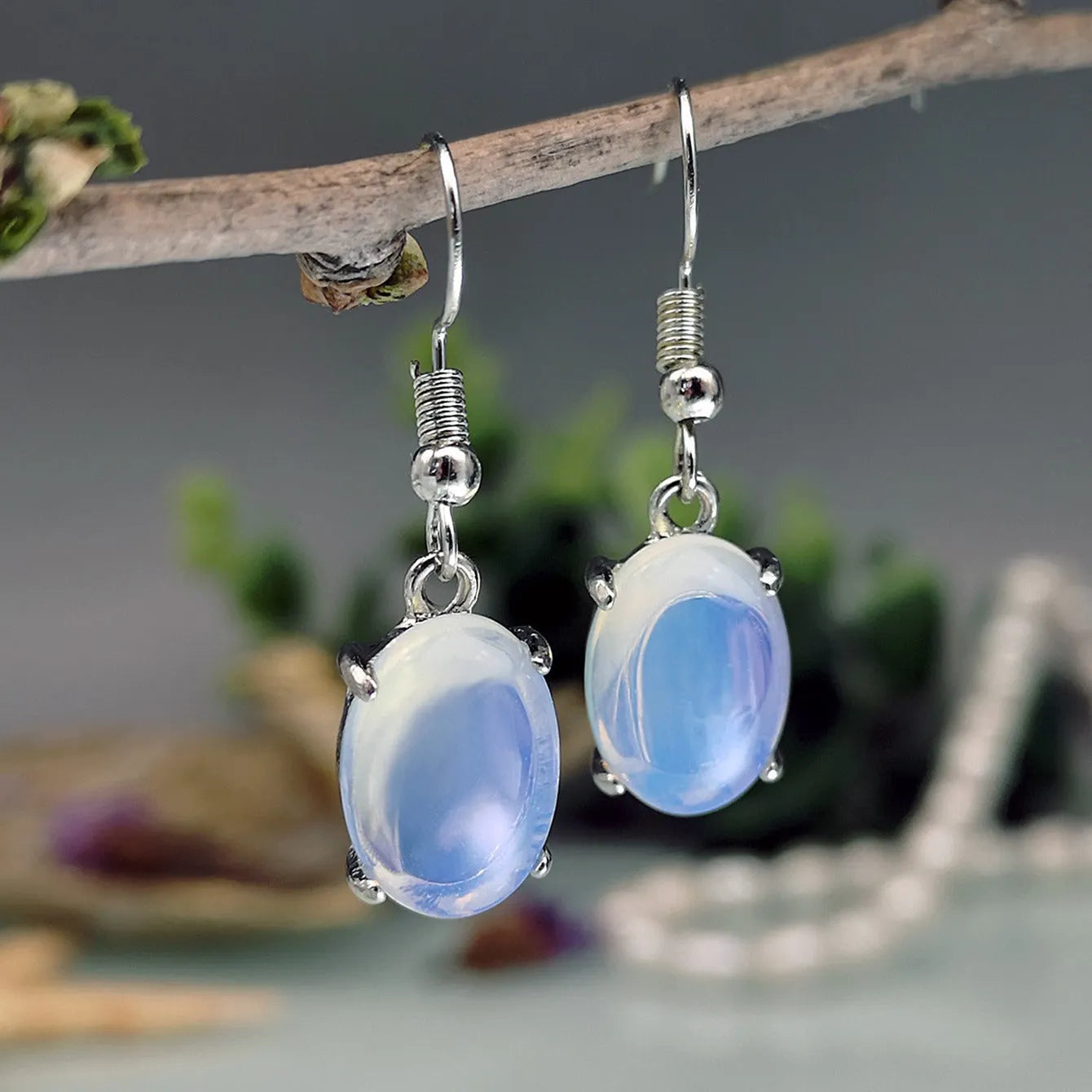 Moonlight white opal drop earrings with retro moonstone design and electroplated alloy finish