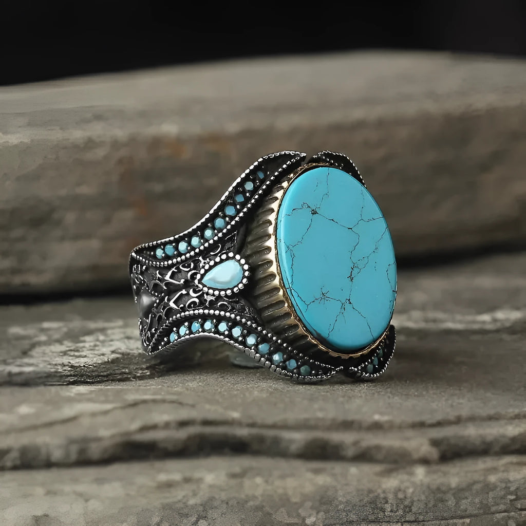 Men's turquoise stone alloy ring with antique silver finish on a round band