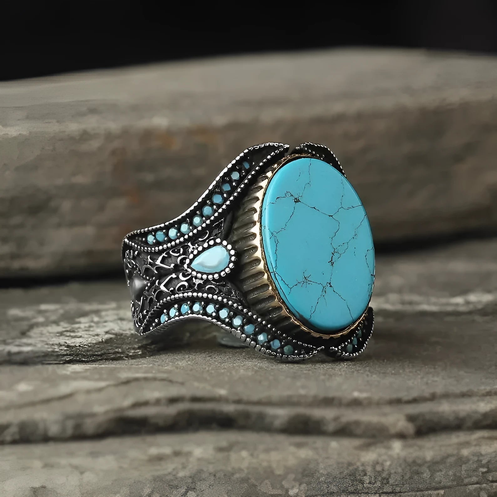 Men's turquoise stone alloy ring with antique silver finish on a round band