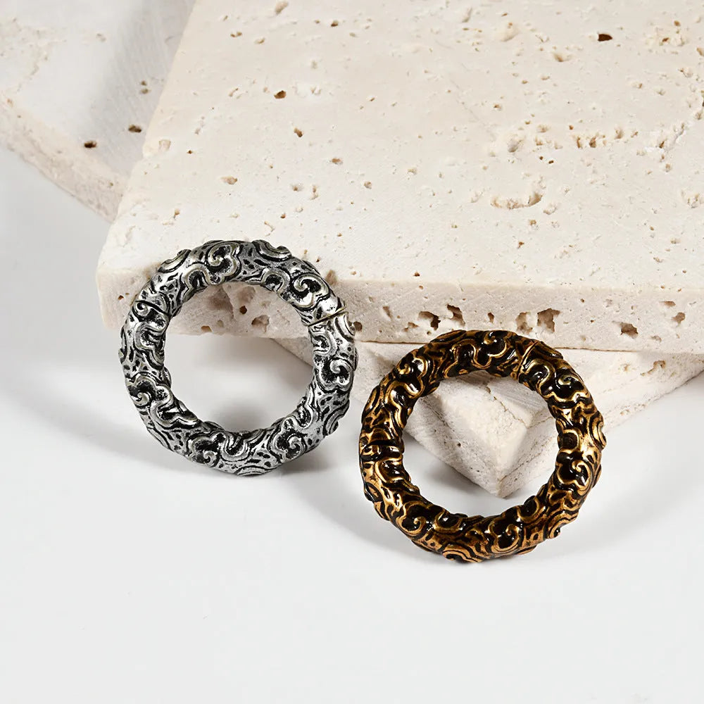 Shaped totem pattern stainless steel earrings with electroplated finish in fashion colours