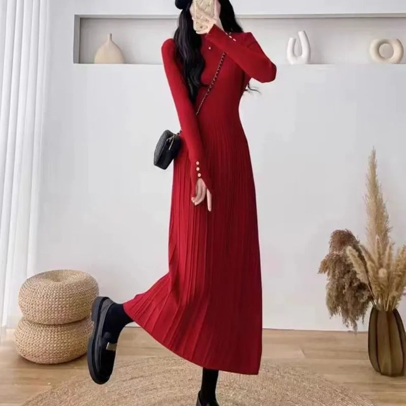 Women's beige knit A-line mid-length skirt with high waist trimming, shown front view.