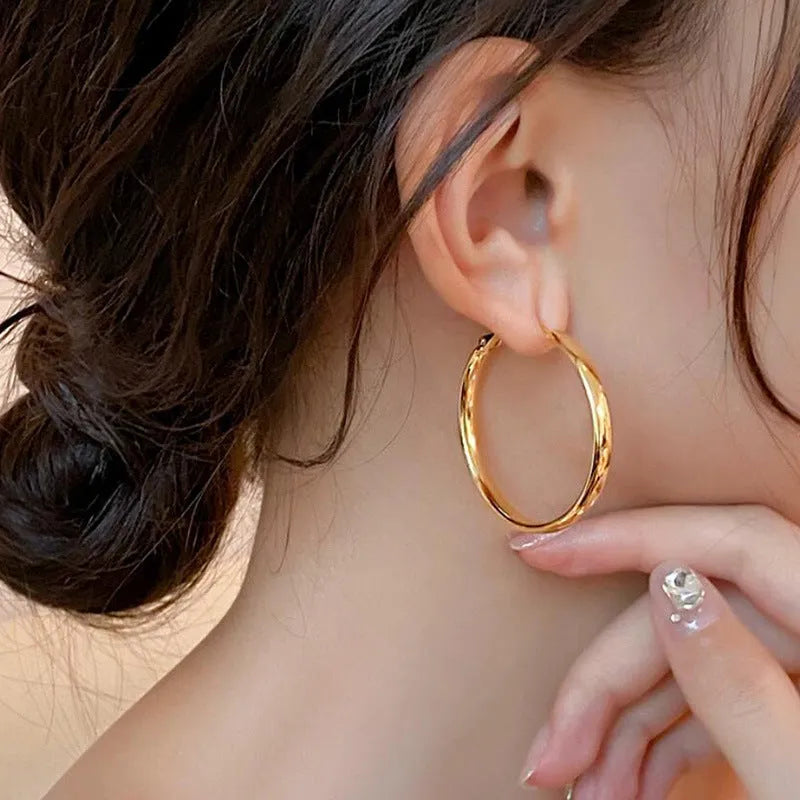 40mm diameter metal circle earrings in gold and silver electroplated finishes