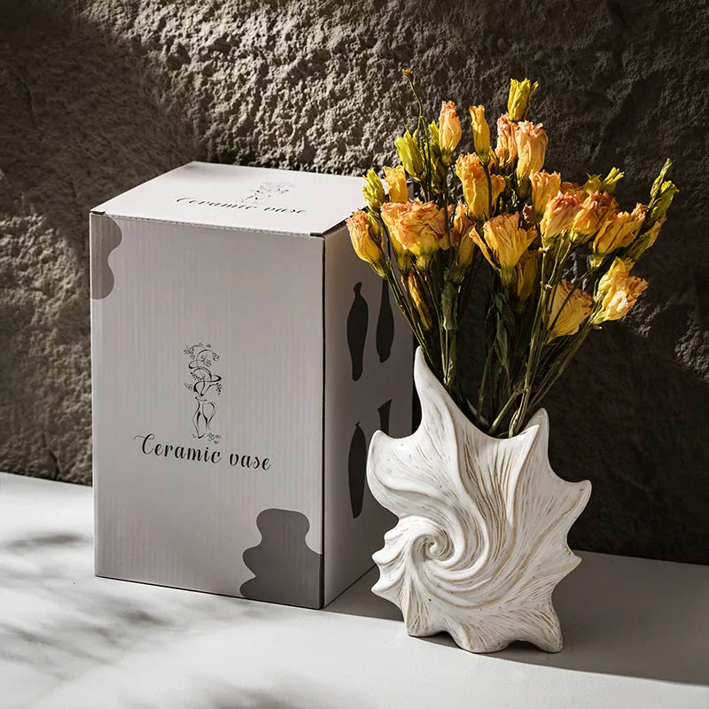 Hexagon-shaped ceramic vase with a coloured glaze finish in a retro creative European style.