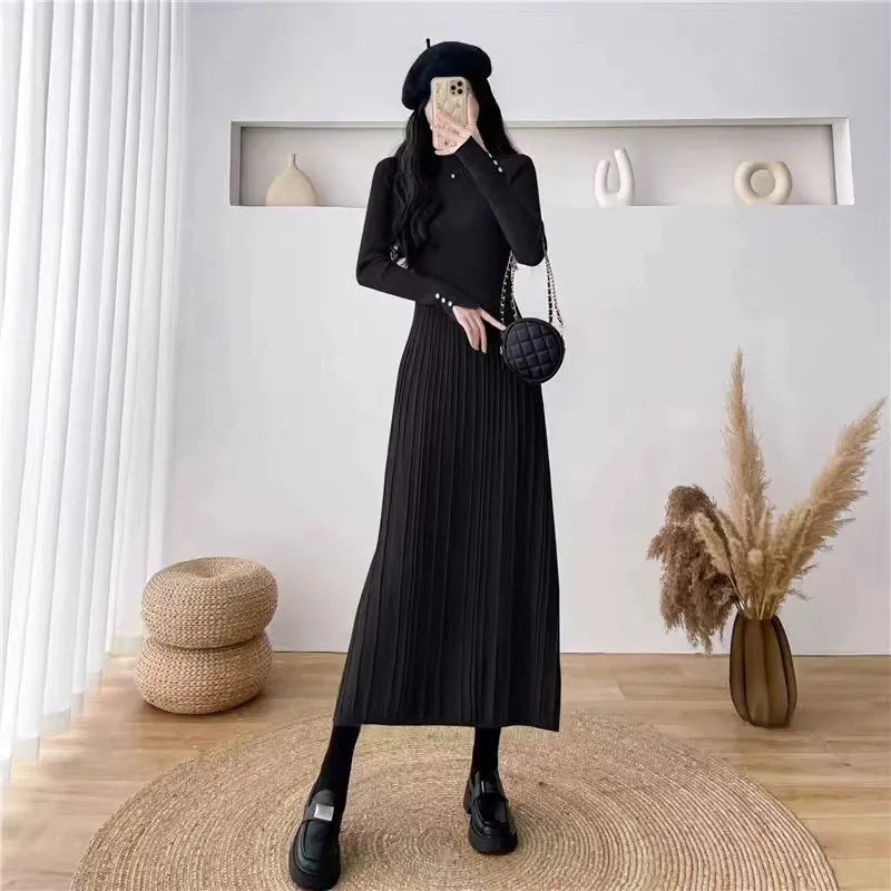 Women's beige knit A-line mid-length skirt with high waist trimming, shown front view.
