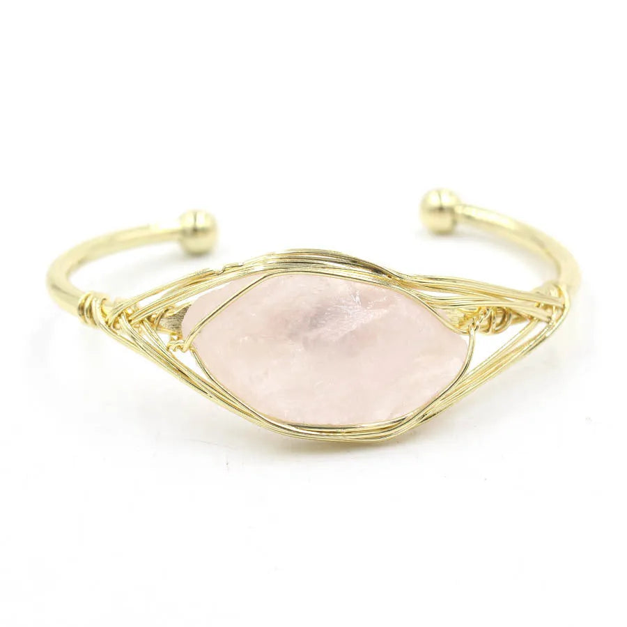 Natural raw gemstone bracelet with 8mm amorphous crystal beads on an adjustable open band.