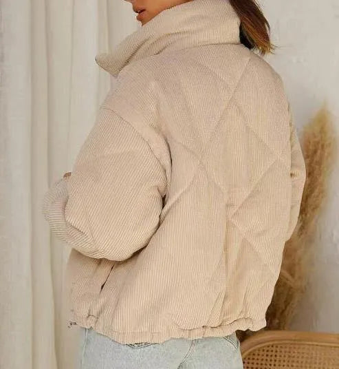Apricot-colour women's corduroy jacket with a stand collar, long sleeves, and a front zip.