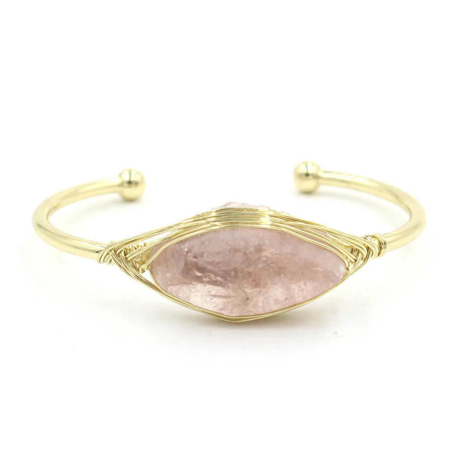Natural raw gemstone bracelet with 8mm amorphous crystal beads on an adjustable open band.