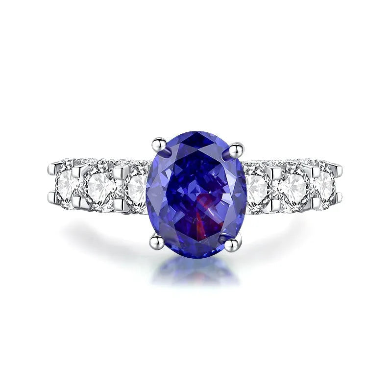 Heart-shaped high carbon diamond ice flower cut colour zircon stone set in a women's 925 sterling silver ring.