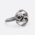 Retro double snake titanium steel ring showing detailed sculptural design on finger