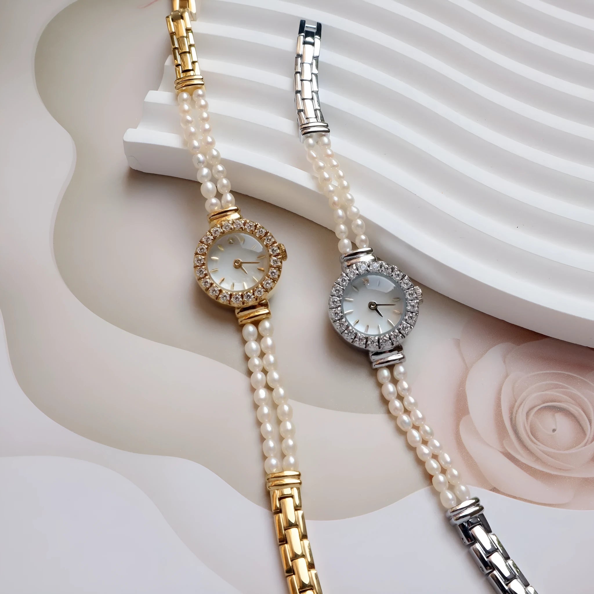 Women's light gold bracelet watch with freshwater pearls, round mineral glass dial, and stainless steel folding buckle