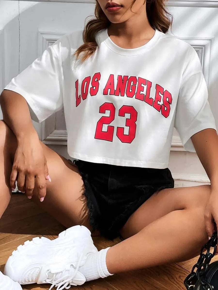 Black personalised cotton t-shirt with printed white English letters, loose fit and exposed navel style.