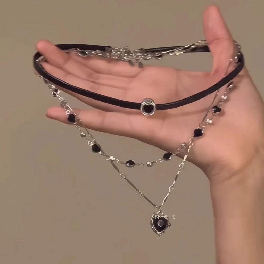 Women's creative multi-layer twin necklace set with heart-shaped leather and crystal pendants on adjustable chain