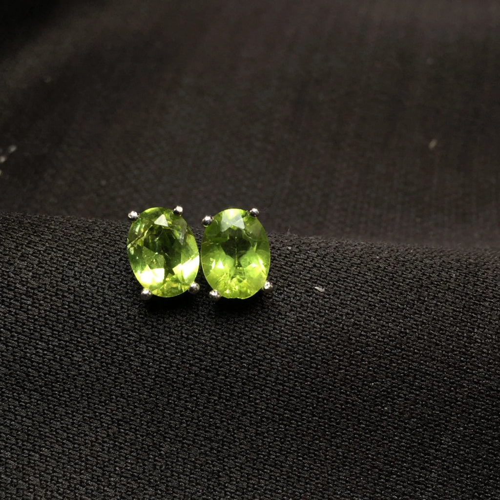 Grass green natural olivine stud earrings in S925 sterling silver setting.