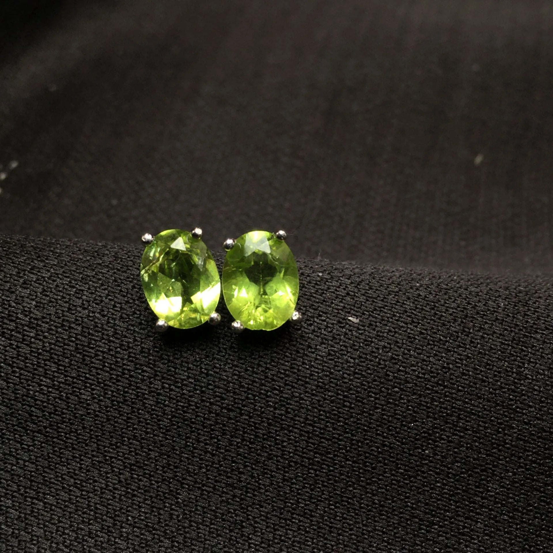 Grass green natural olivine stud earrings in S925 sterling silver setting.