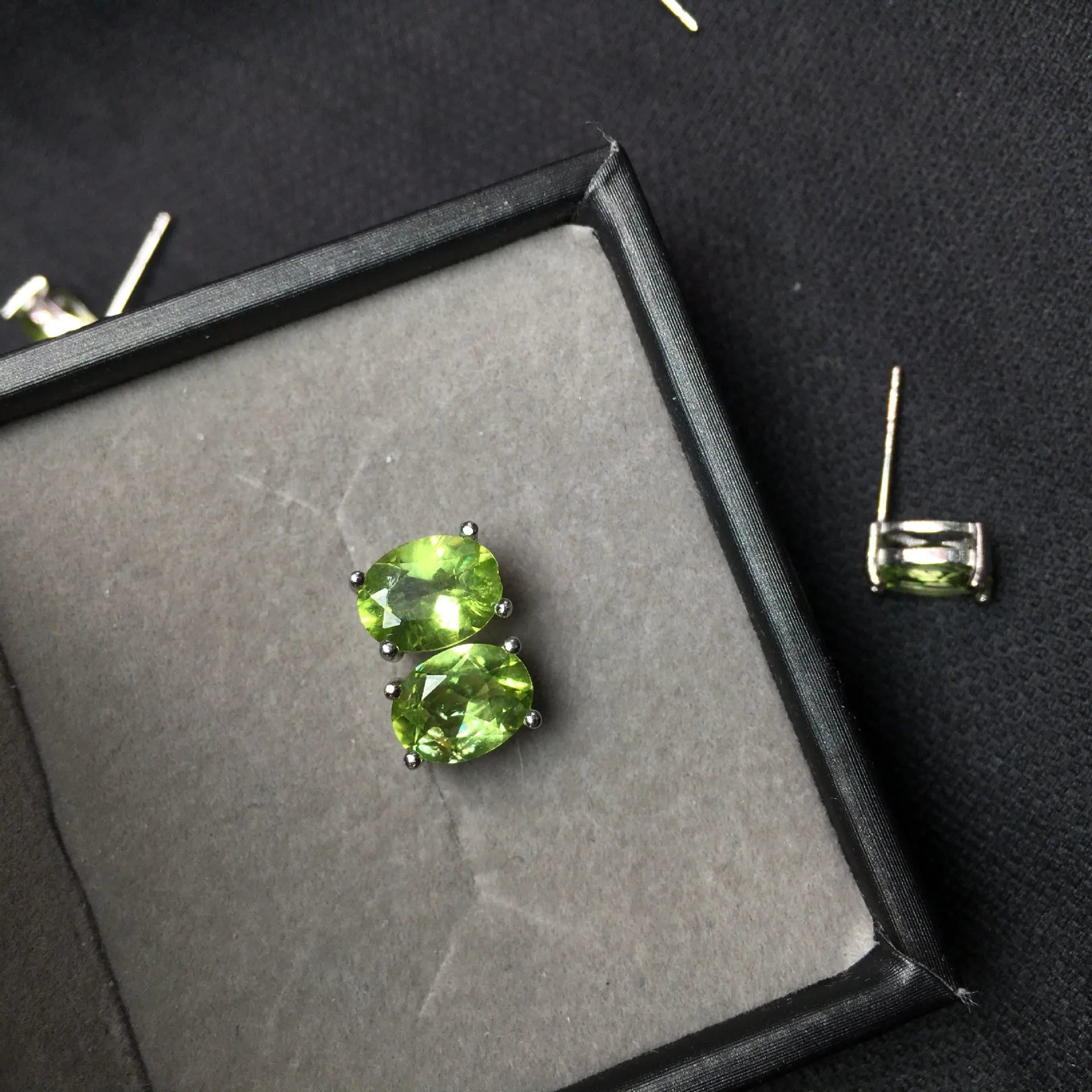 Grass green natural olivine stud earrings in S925 sterling silver setting.