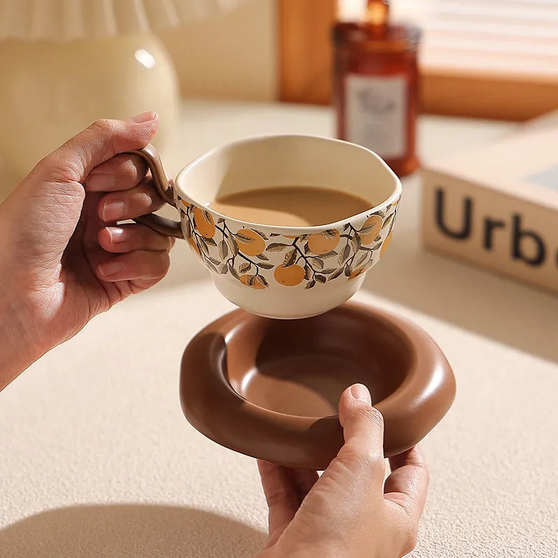 Antique style ceramic coffee cup and saucer set with 210ml capacity in black or orange retro design