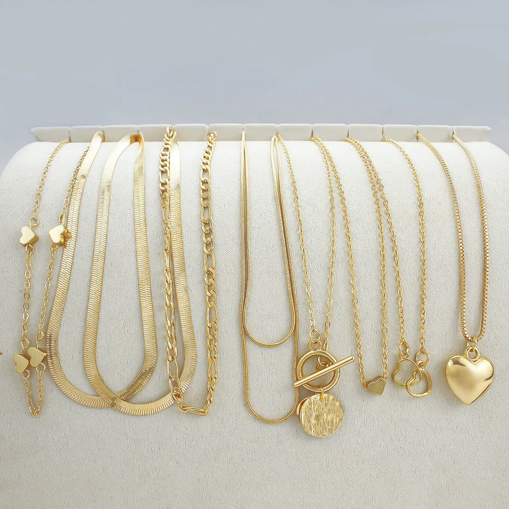 Ten gold electroplated necklaces with alloy pendants on snake bones chains, adjustable 21-50cm length