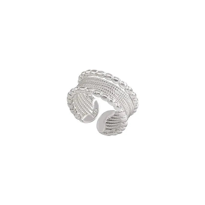 Women's copper alloy ring with woven twisted geometric design and adjustable opening