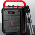 MS62AI portable Bluetooth speaker with wireless microphone and remote control on a table.