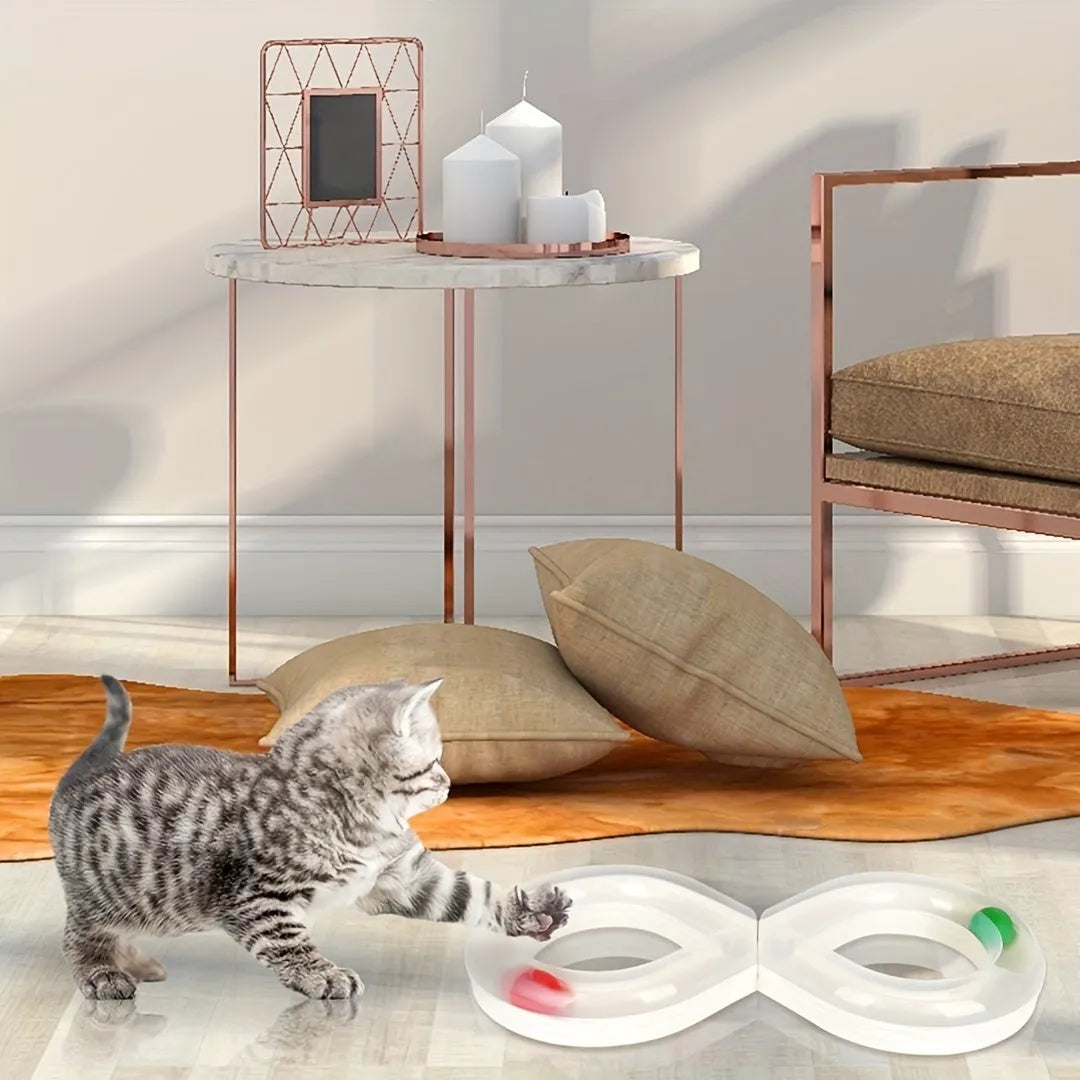Blue and white circular cat turntable track with four spinning balls and teasing stick for feline play