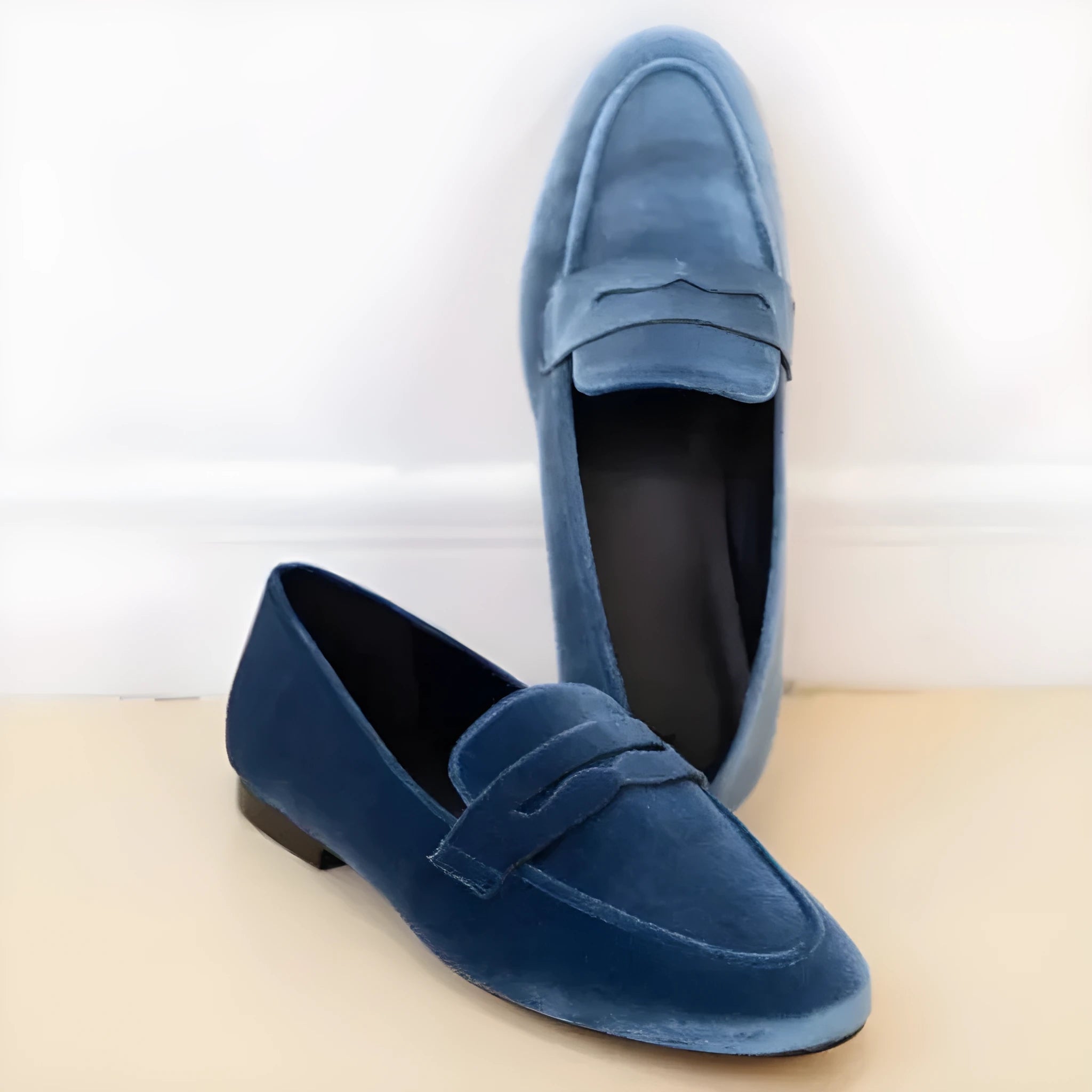 Blue and black women's flat loafers with round toe and low-top suede-style PU upper on a rubber sole.
