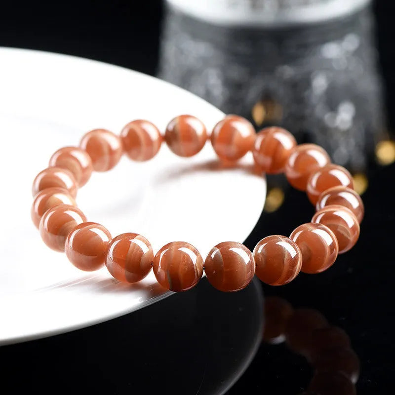 Natural rhodochrosite bracelet with round beads in old mine colour from Peru