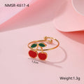 Cherry jewellery set showing necklace, bracelet, earrings, and ring with stainless steel construction and 18K gold electroplated finish