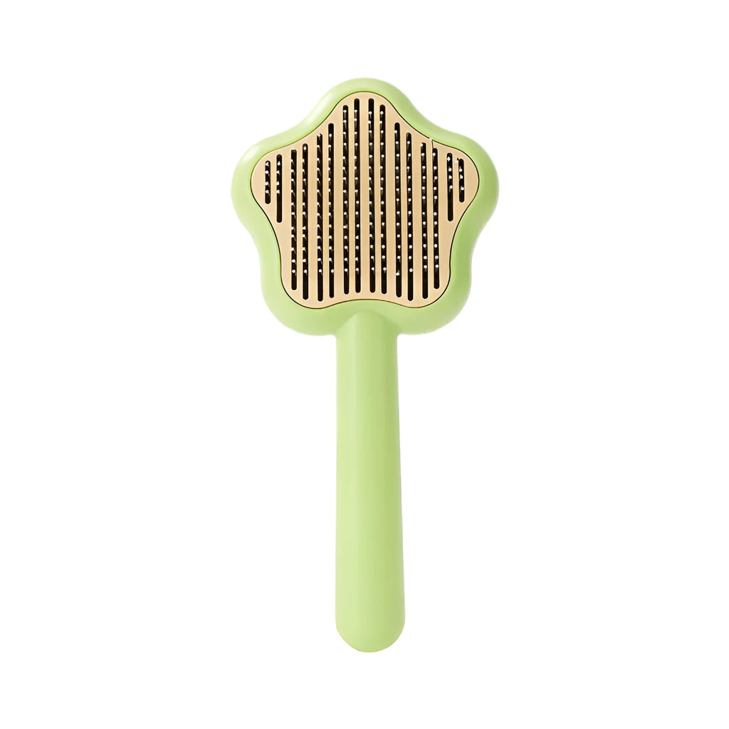Self-cleaning stainless steel cat comb in green colour measuring 20cm long by 9.5cm wide