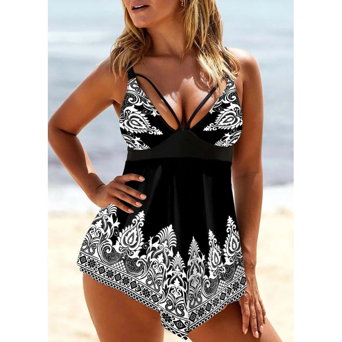 Women's plus size swimsuit with printed straps and deep V-neckline in gradient print pattern