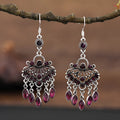 Purple drop shape fringe earrings with retro crystal detailing and ethnic style elements