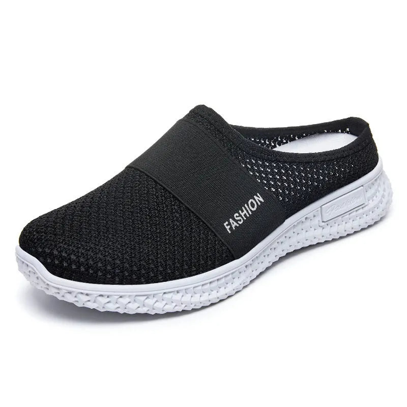 Women's casual shoes with mesh upper and hollow out detailing in round toe shape with flat heel