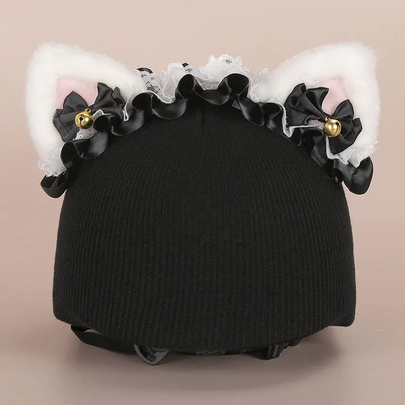 A plush fabric helmet cover with cartoon character ears, shown in size M for bicycle or motorbike use.