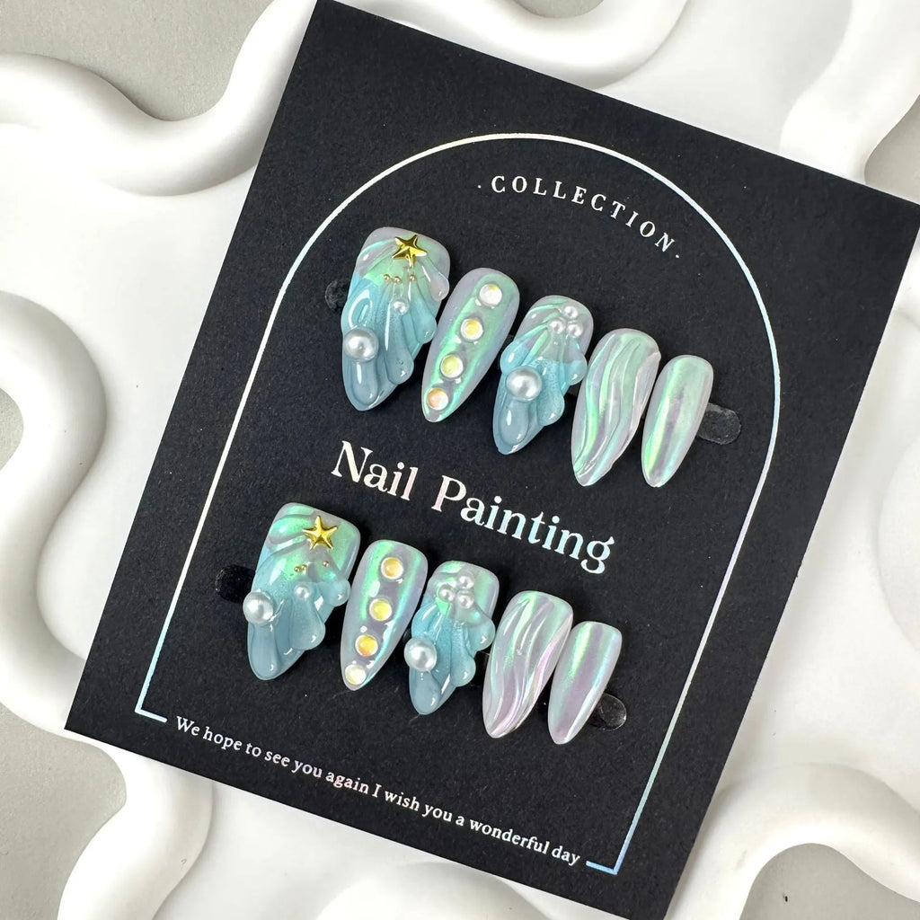 HAILANG blue plastic false nail tips set showing shell design with XS, S, M, L sizes.