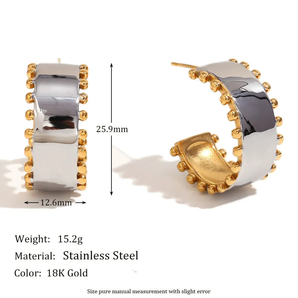 Gold electroplated women's jewellery set with geometric earrings, bracelet, and necklace on stainless steel
