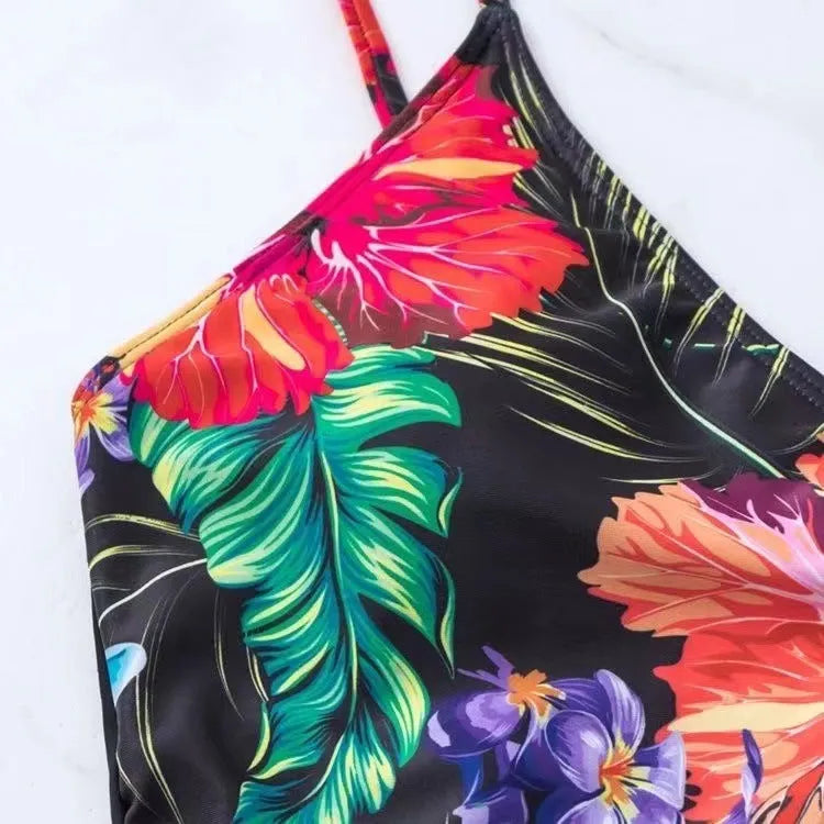 Women's black high waist briefs with split bikini construction and printed design for swimming and sports
