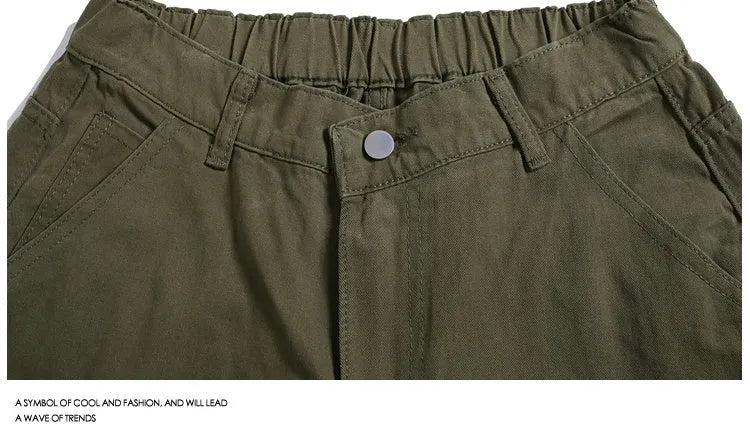 Women's loose-fit cropped pants in micro-elastic fabric showing apricot colour with wide-leg design