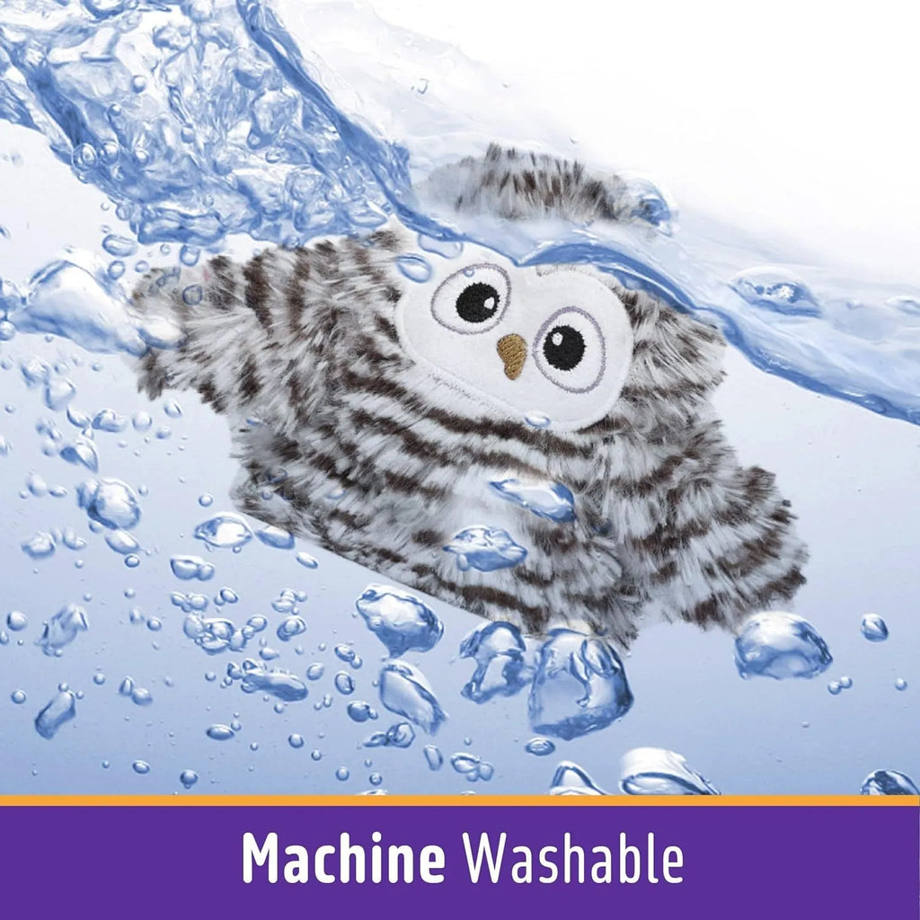 Grey automatic chirping owl cat toy with beating wings on a floor.